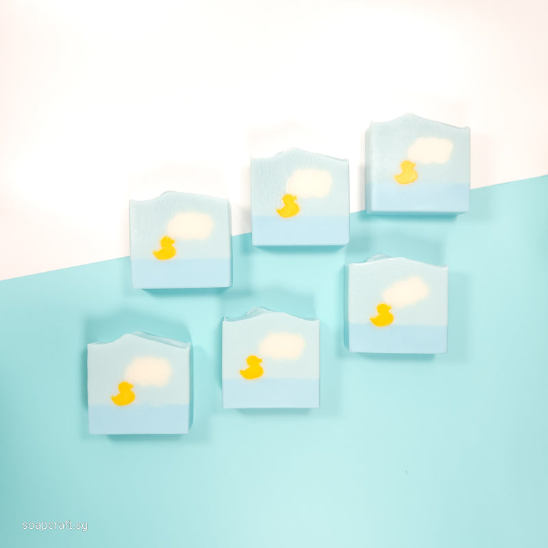 little duckie on a beautiful day with clouds face and body bar soap, scented with lavender essential oil