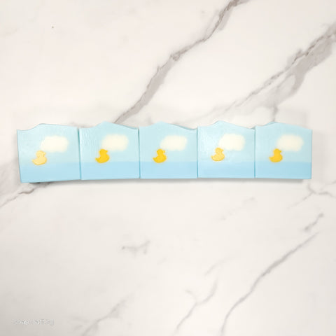 little duckie on a beautiful day with clouds face and body bar soap, scented with lavender essential oil